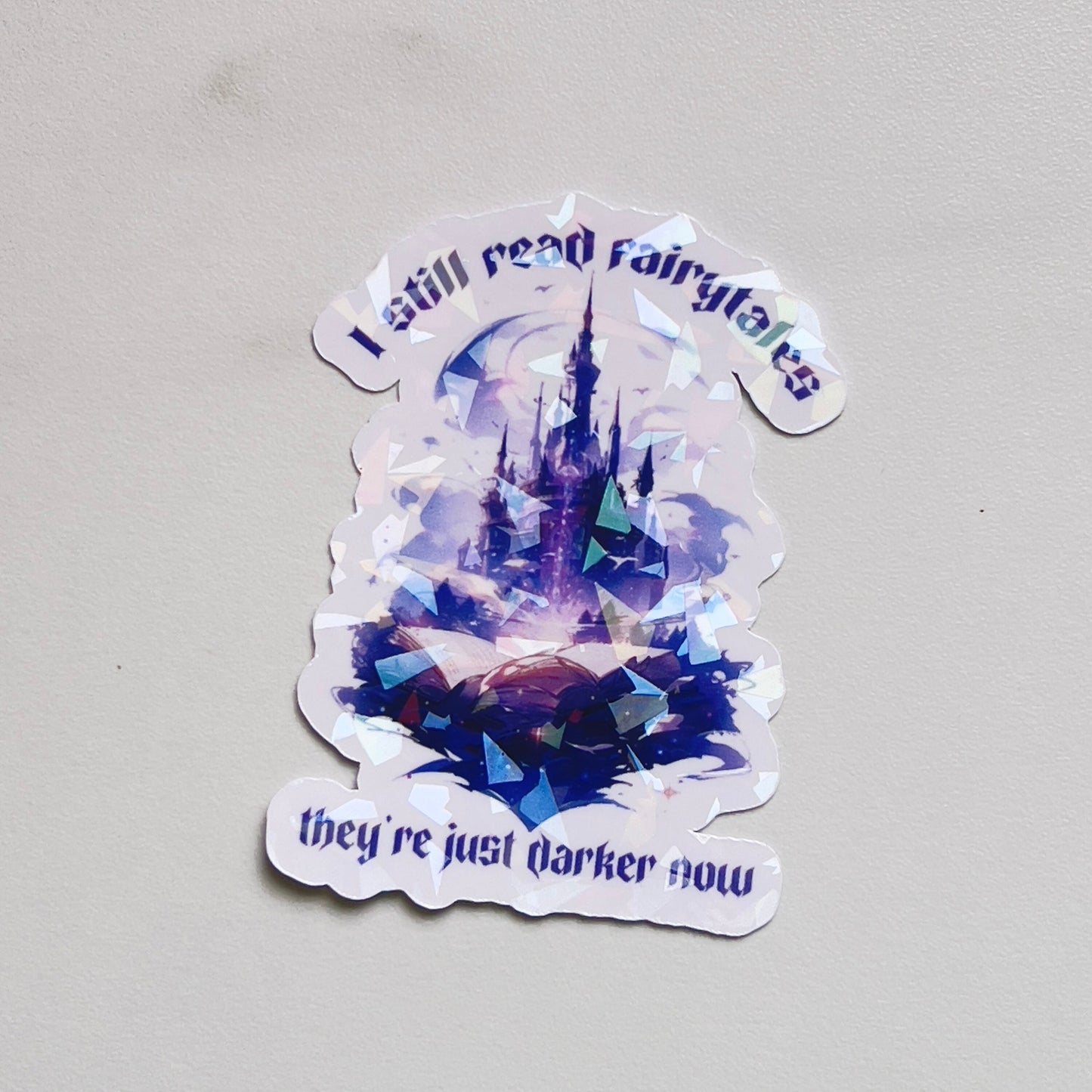 I Still Read Fairytales They're Just Darker Holographic Sticker