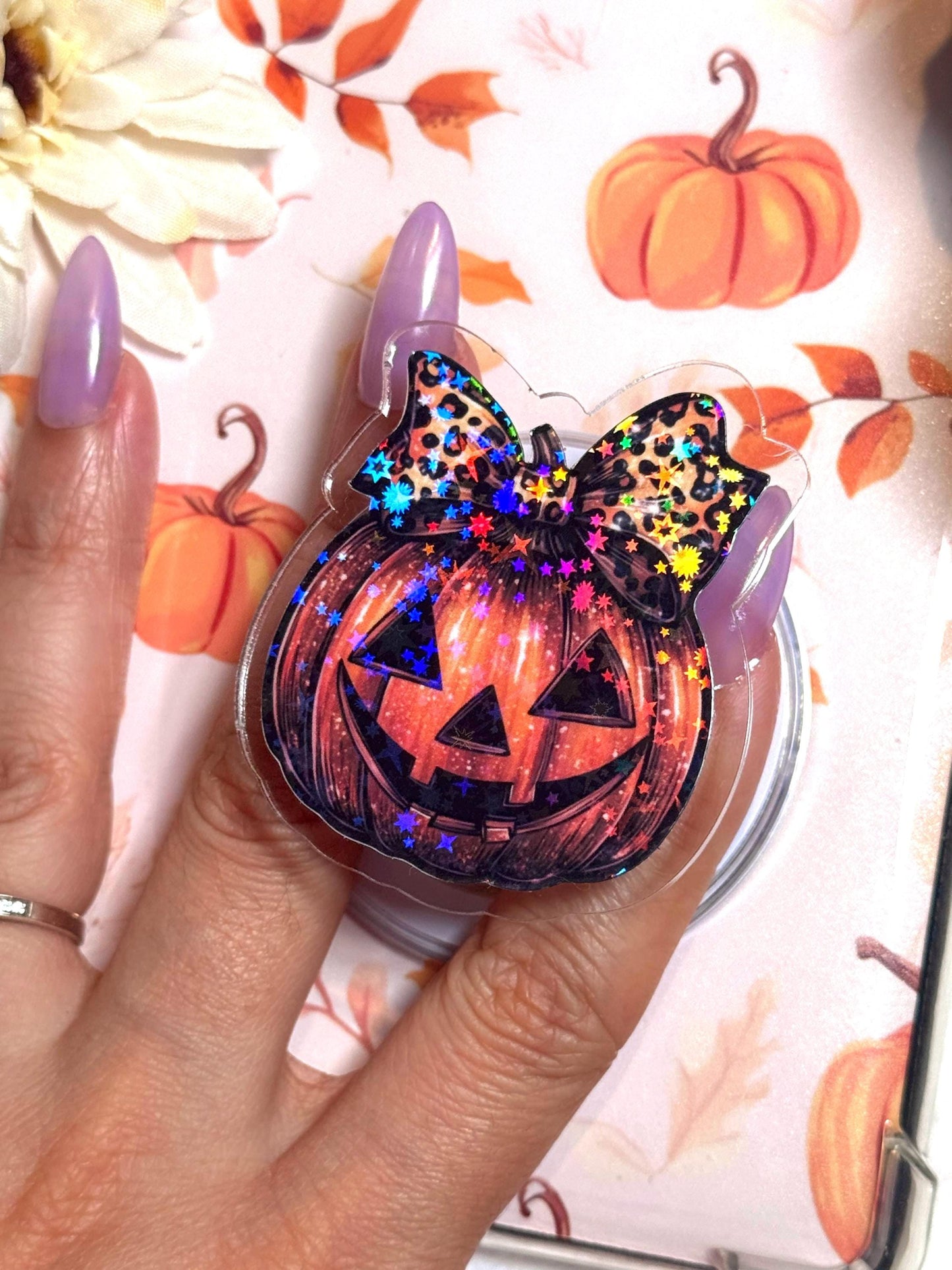 Pumpkin Bow Holographic Kindle Grip – Halloween Jack-O’-Lantern MagSafe Phone & Tablet Stand