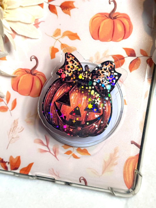 Pumpkin Bow Holographic Kindle Grip – Halloween Jack-O’-Lantern MagSafe Phone & Tablet Stand